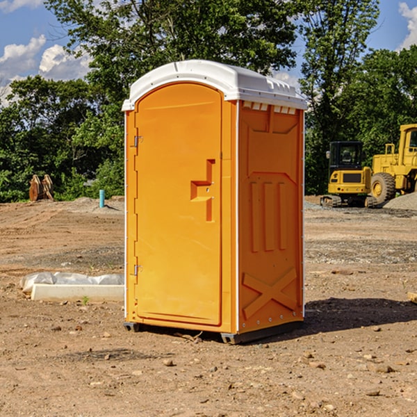 how often are the portable restrooms cleaned and serviced during a rental period in Conehatta